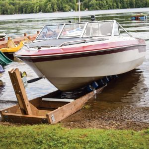 Dock Edge+ Watercraft Ramp Kit in use with a boat